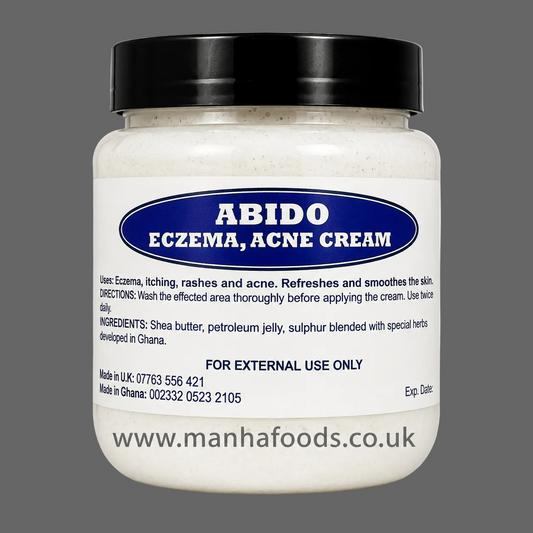 A jar of Abido Eczema, Acne Cream by Manha Foods, featuring a white cream-colored jar, a black lid, and a white label with a blue oval logo.